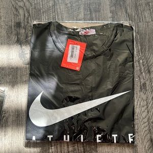 Black Nike Athlete T shirt.